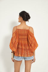 BURNT ORANGE OFF-SHOULDER SMOCKED TOP