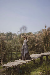 Embroidered Peplum With a Pleated Skirt